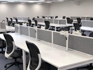 Bench Desking with Monitor Arms in Office