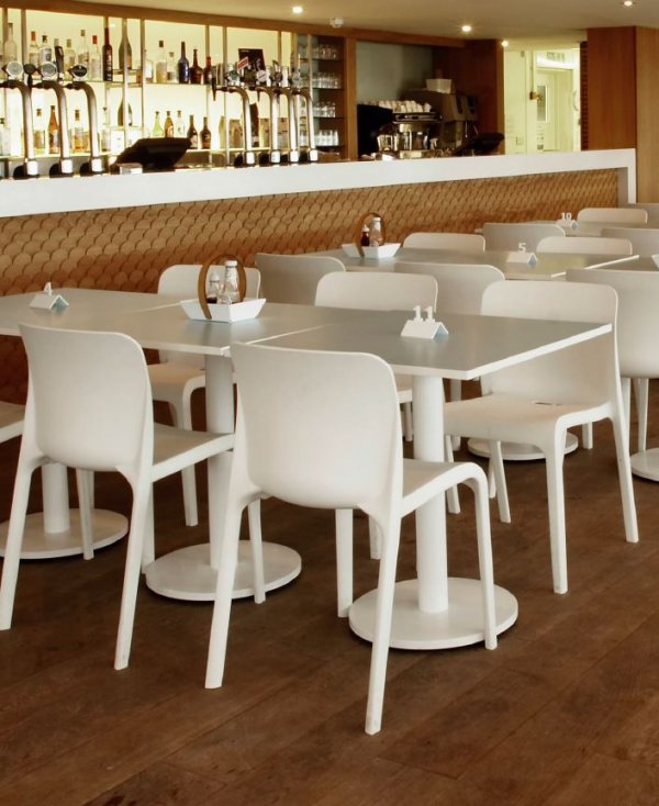 White Plastic Chairs in Bar Seating Area
