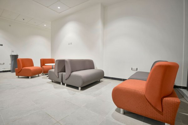Grey and Orange Modular Sofas In Situ