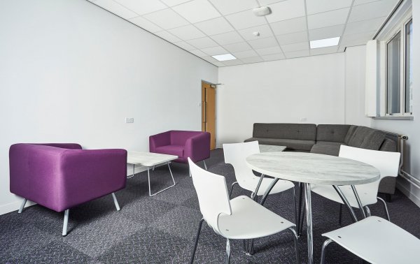 White Canteen Chairs Around Round Table