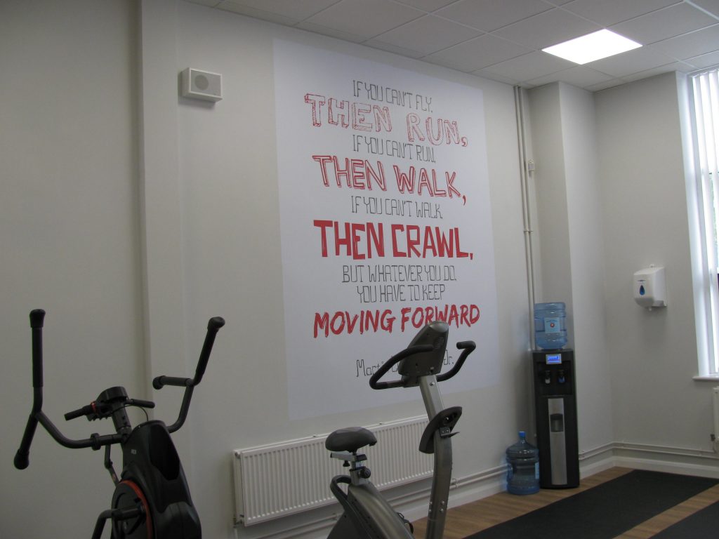 Custom-Imagery-On-Staff-Gym-Wall